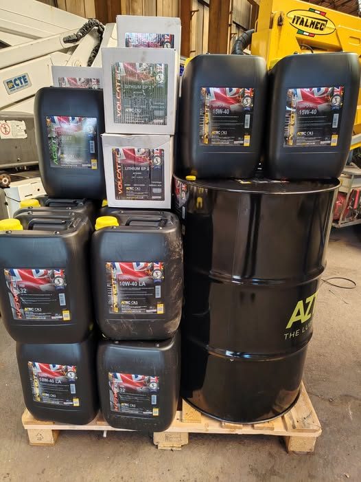 Pallet of hydraulic oil, engine oil and grease in stock